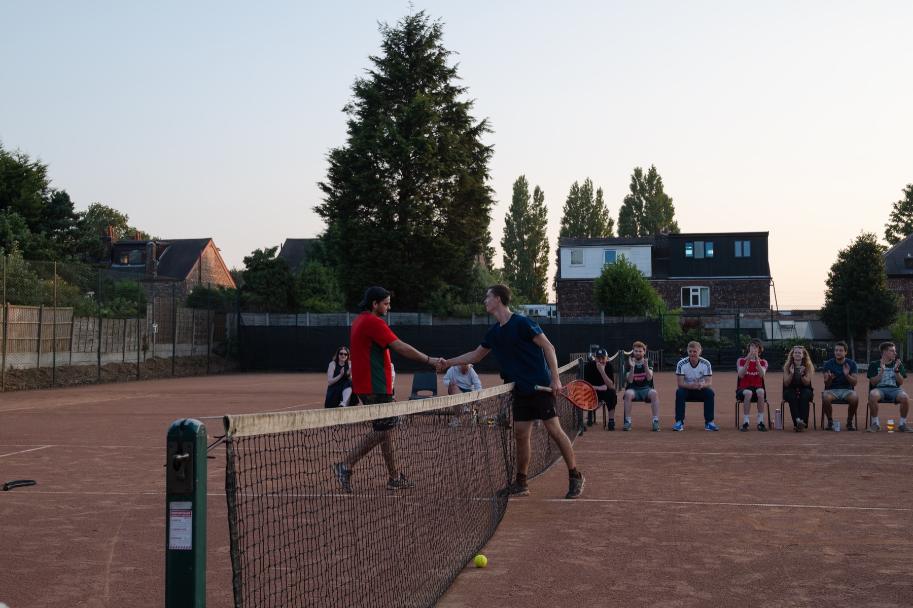 Players shaking hands after a tournament match at Claremont